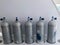 Many large metal, aluminum oxygen cylinders for breathing and diving stand on special stands on board a boat, ship, cruise liner,