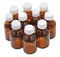 Many little closed amber glass pharmacy bottles