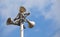 Many loudspeakers against cloudy blue sky