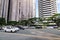 Many luxury cars run on Ayala street in Manila, Philippines