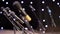Many microphones on stage in the rays of twinkling lights