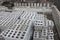 Many neatly folded gray cinder blocks background closeup. concrete mixer