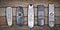 Many old TV remotes on a wooden background. Top view