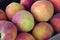Many organic peaches fruit basket at the market