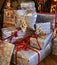 Many packed Christmas presents with decoration