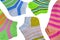 Many Pairs Colorful Striped Socks Isolated On White