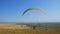 Many paragliders are flying. Silhouette people Paragliding. Paraglide flight experience skydive summer.