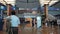 Many passenger walking in front of check-in counter at Changi International Airport, Singapor