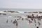 Many people bathing in the sea of Cape Comorin