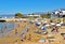 Many people enjoy a summer day at the Star Beach of Hersonissos on the island of Crete in Greece