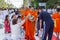 Many people give food and drink for alms to 1,536 Buddhist monks in visakha bucha day