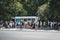 Many people standing in queue  on street at tourist attraction German Reichstag on summer day in Berlin, Germany