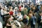 Many people tasting sorts of beer in huge hall of the bar