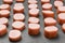 Many pieces of fresh pork sausages of different sizes are cut for frying and adding to soup. Semimanufactures. creative background