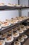 Many plates of appetizers being prepared in commercial kitchen, for an event, selective focus