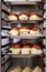 Many plates of appetizers being prepared in commercial kitchen, for an event, selective focus