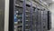 Many powerful servers running in the data center server room. Many servers in a data center. Many racks with servers