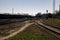 Many rail rails near the station and blue sky