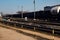 Many rail rails near the station and blue sky