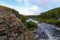 Many rapids with waterfalls, spray foam and whirlpools close-up, rotate camera. Ural region, Russia. The threshold Revun