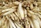 Many raw white asparagus on a rural  market shelf. Food background