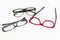 Many red and black eyeglasses