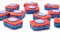 Many red and blue dishwasher soap tablets on white background, kitchen equipment and solutions for washing dishes, housekeeping