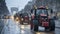 many red farm tractors driving along the road in the city, with the Triumphal Arch in the background, road strike