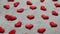 Many red hearts on concrete background, seamless pattern