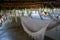 Many relaxing hammocks in a big beach bungalow