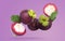 Many ripe mangosteen fruits and leaves falling on violet background
