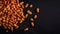 Many roasted peanuts on dark background. Food Backdrop. Generative AI