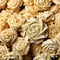 Many roses made of cream, pastry background, sweets, cake