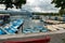 Many rowboats and paddleboats on the harbor in Rapperswil waiting to be rented out