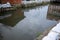 Many Sandbags along a canal protect the historic old town from flooding