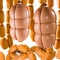 Many sausage closeup on a white background