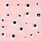 Many self-adhesive doll eyes on square pink paper
