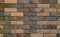 Many Shades of Brown Terracotta Rough Bricks Wall