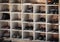 Many Shoes in Cubby Holes at Entrance to Hindu Temple