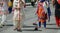 Many Sikhs women barefoot while scavenging the road