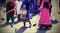 Many Sikhs women barefoot while scavenging the road during a Sikh festival