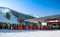 Many skiers in front of cableway Funitel in ski resort Jasna, Slovakia