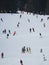 Many skiers skiing in dolomites gardena valley snow mountains