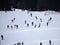 Many skiers skiing in dolomites gardena valley snow mountains