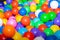Many small colorful balls for ball bath