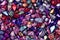 Many small ruby and diamond stones, luxury background. Neural network AI generated