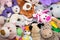 Many Soft plush fluffy toys sits in the children`s room