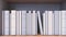 Many spines of the books form the Italian flag. Education or science in Italy