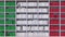 Many spines of the books form the Italian flag. Education or science in Italy. 3D rendering
