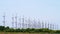 Many steel frame wind turbines Located in the mangrove forest.